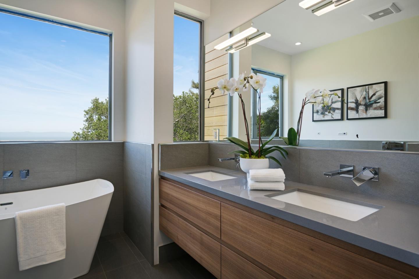 2841 Hillside Drive Burlingame, CA 94010 - Photo 15 of 38 a bathroom with a tub sink and mirror