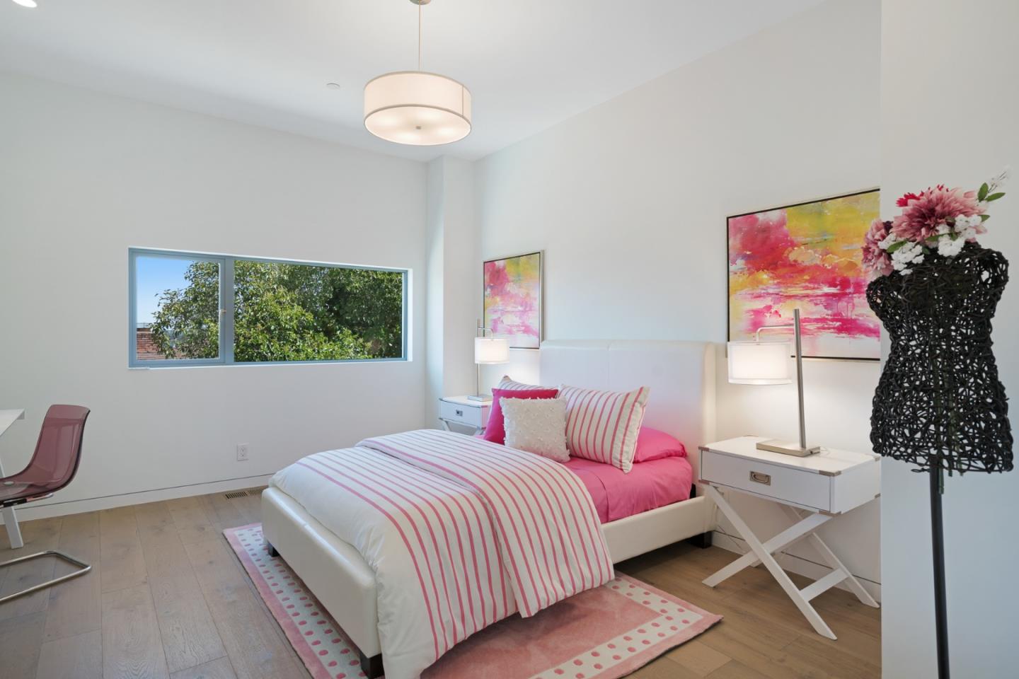 2841 Hillside Drive Burlingame, CA 94010 - Photo 19 of 38 a bedroom with a large bed and a window