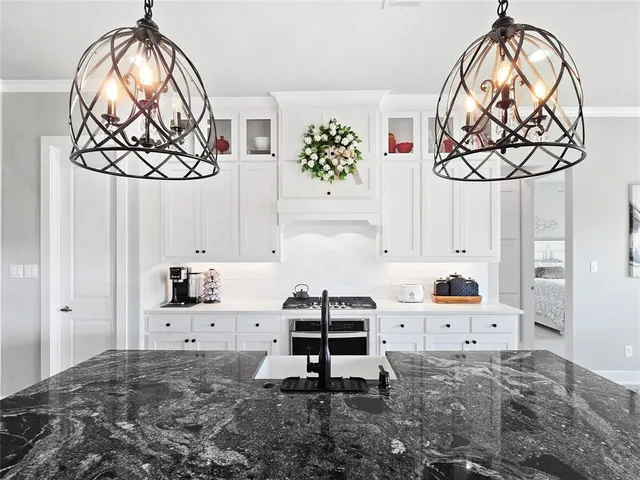 a bedroom with a bed and cabinets