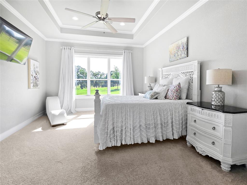 1008 Henry Way Springtown, TX 76082 - Photo 33 of 40 a bedroom with a bed and a couch