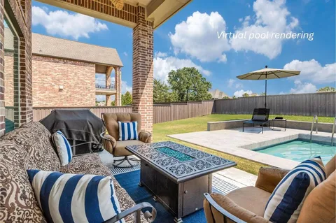 a view of a livingroom with furniture and table