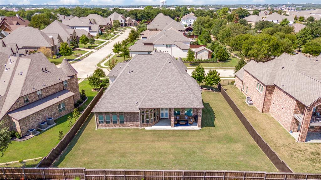 6809 Strauss Colleyville, TX 76034 - Photo 37 of 39 a aerial view of a house with a yard