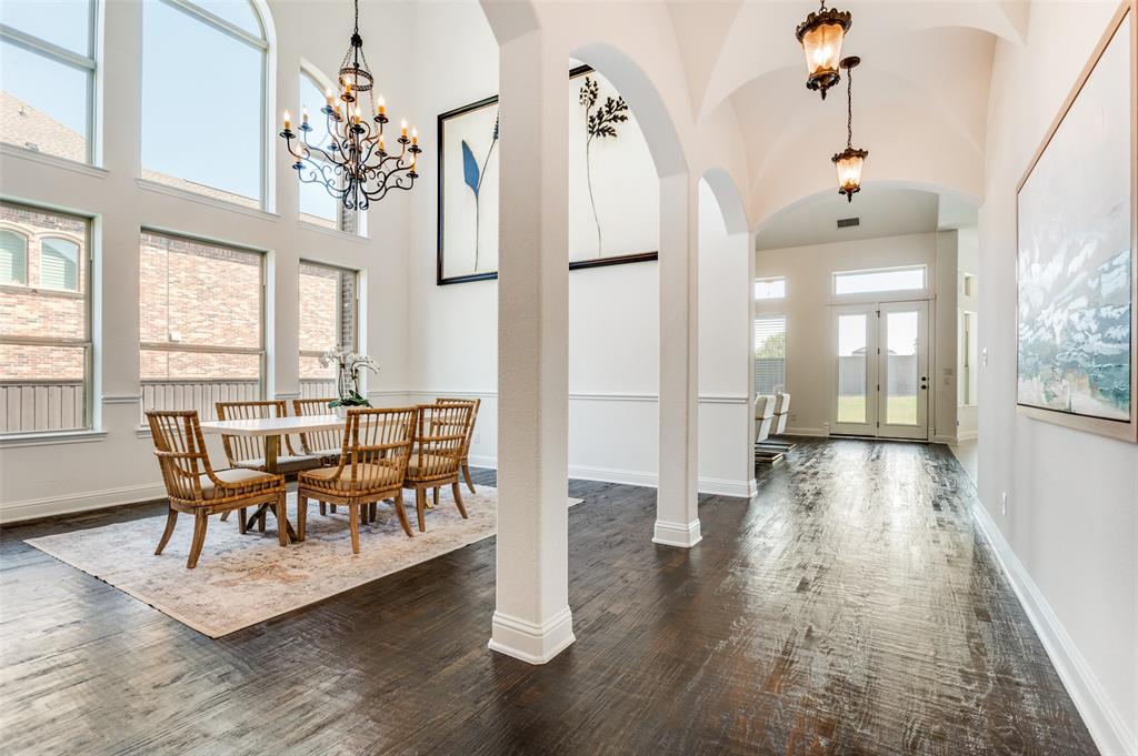 6809 Strauss Colleyville, TX 76034 - Photo 4 of 39 a view of a dining room with furniture and wooden floor