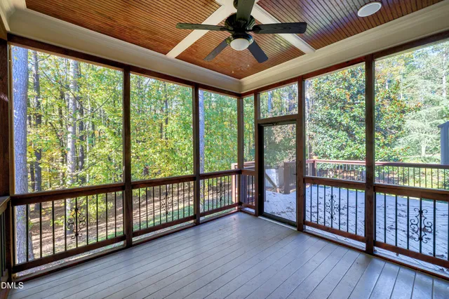 a view of a porch with wooden floor
