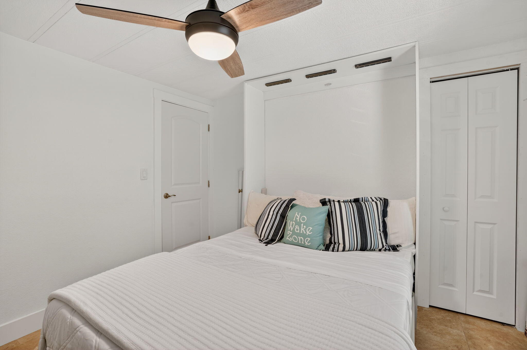 1127 Gulfstream Lane Key Largo, FL 33037 - Photo 14 of 40 a bedroom with a bed and a window