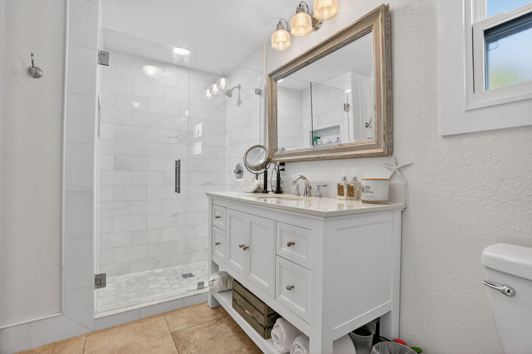 1127 Gulfstream Lane Key Largo, FL 33037 - Photo 19 of 40 a bathroom with a double vanity sink mirror and shower