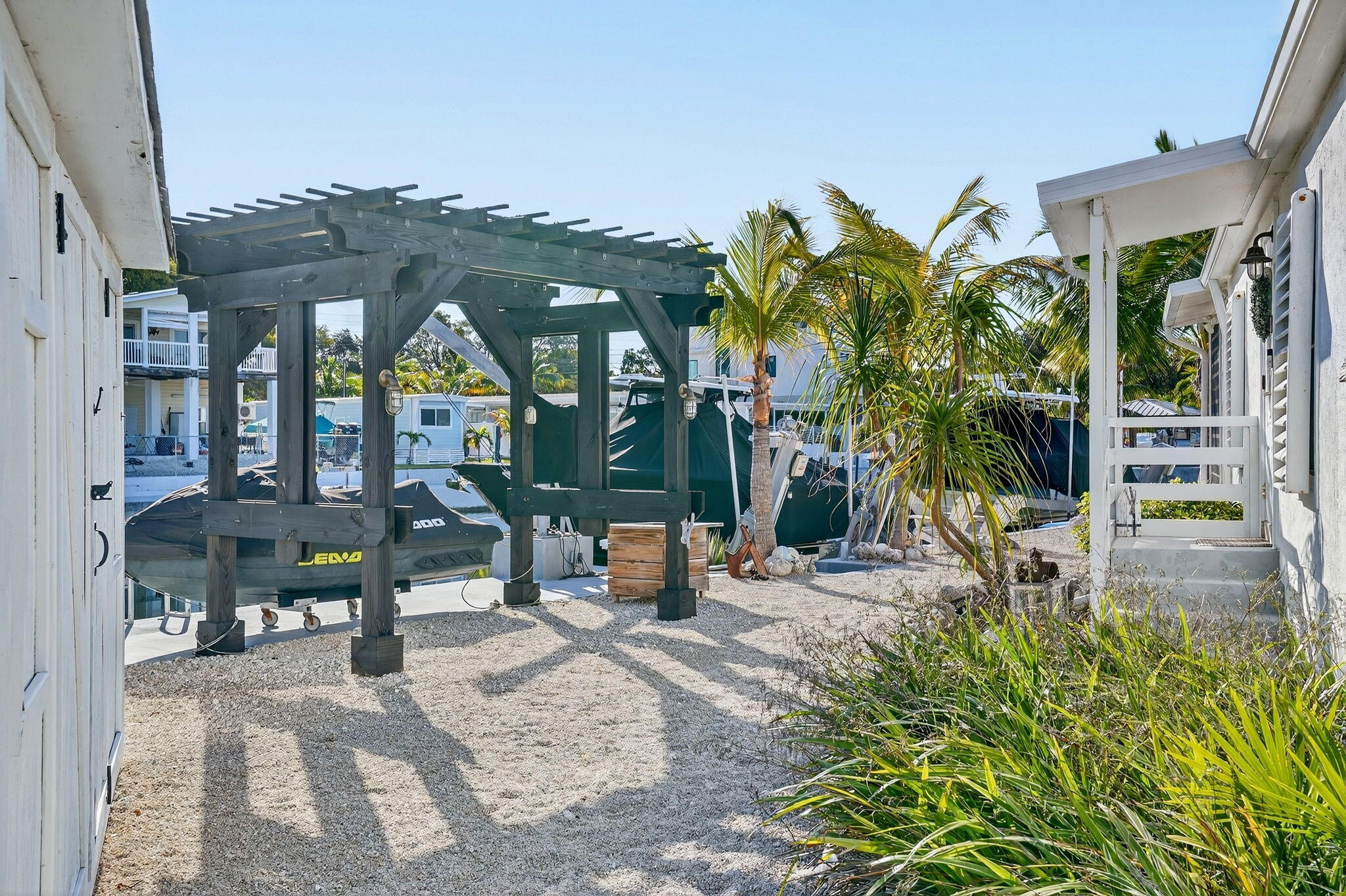 1127 Gulfstream Lane Key Largo, FL 33037 - Photo 22 of 40 a view of a building with sitting area