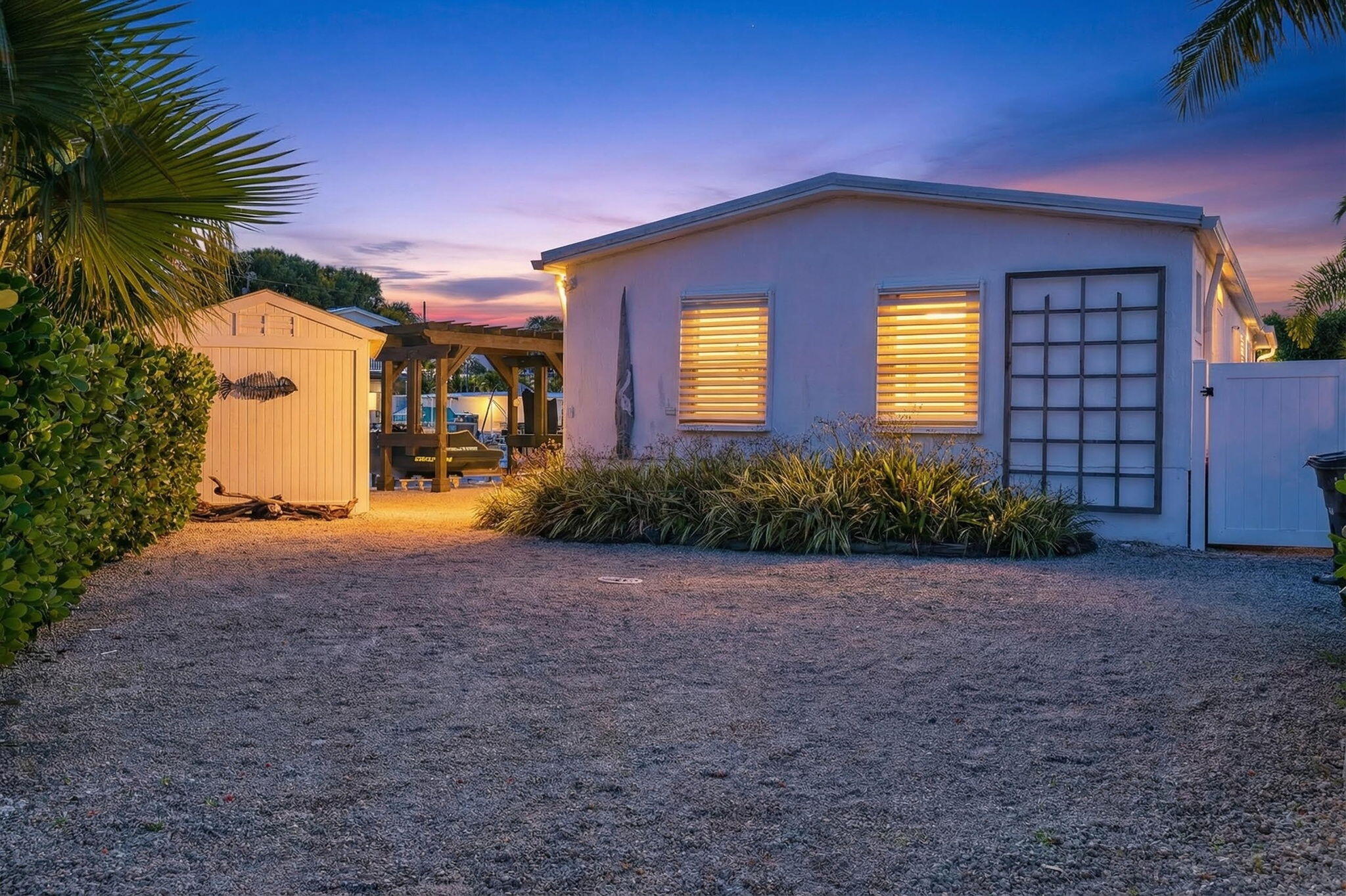 1127 Gulfstream Lane Key Largo, FL 33037 - Photo 3 of 40 a front view of a house with a yard