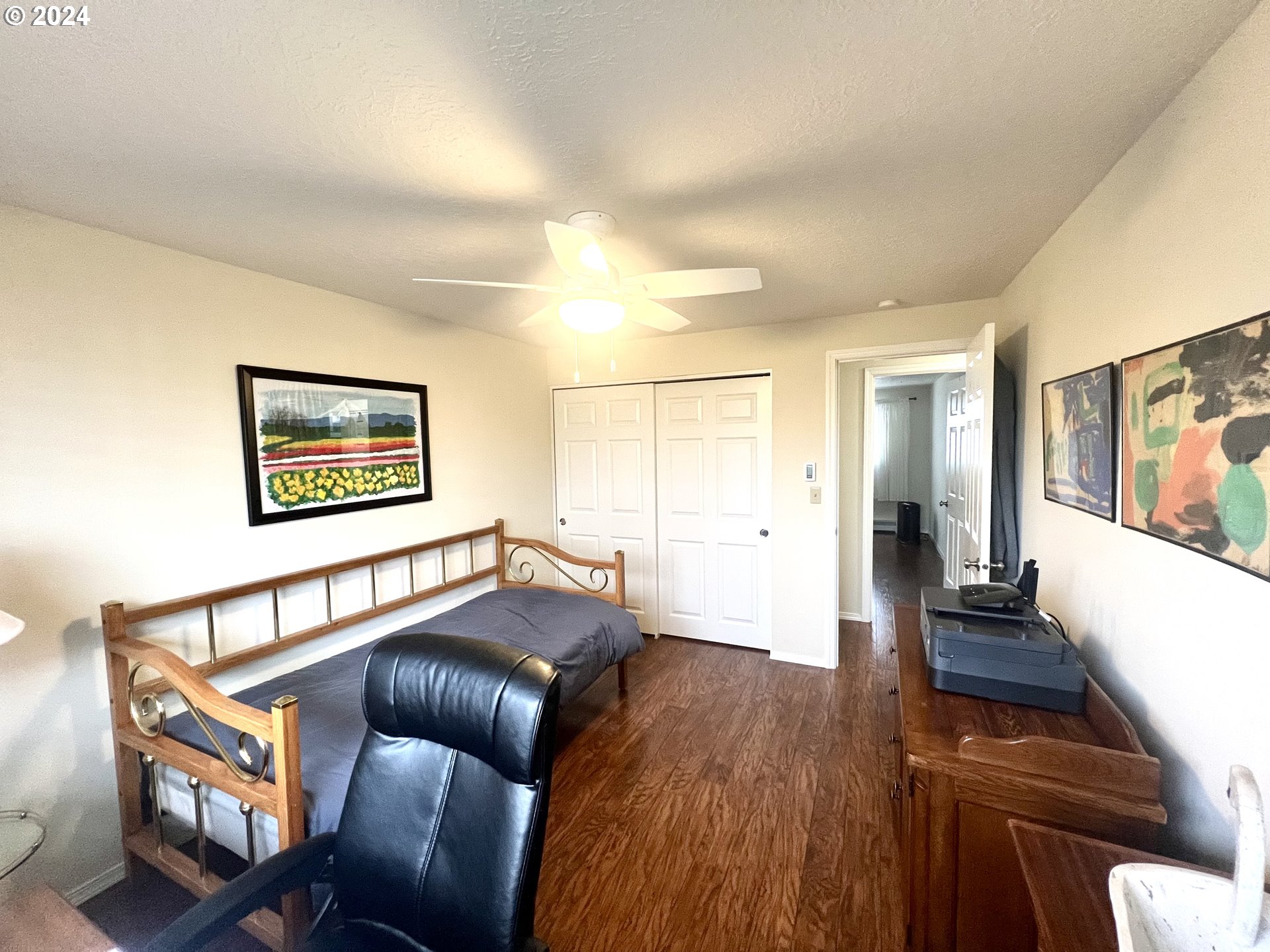 1644 Astor Way Woodburn, OR 97071 - Photo 18 of 28 a living room with furniture and a wooden floor