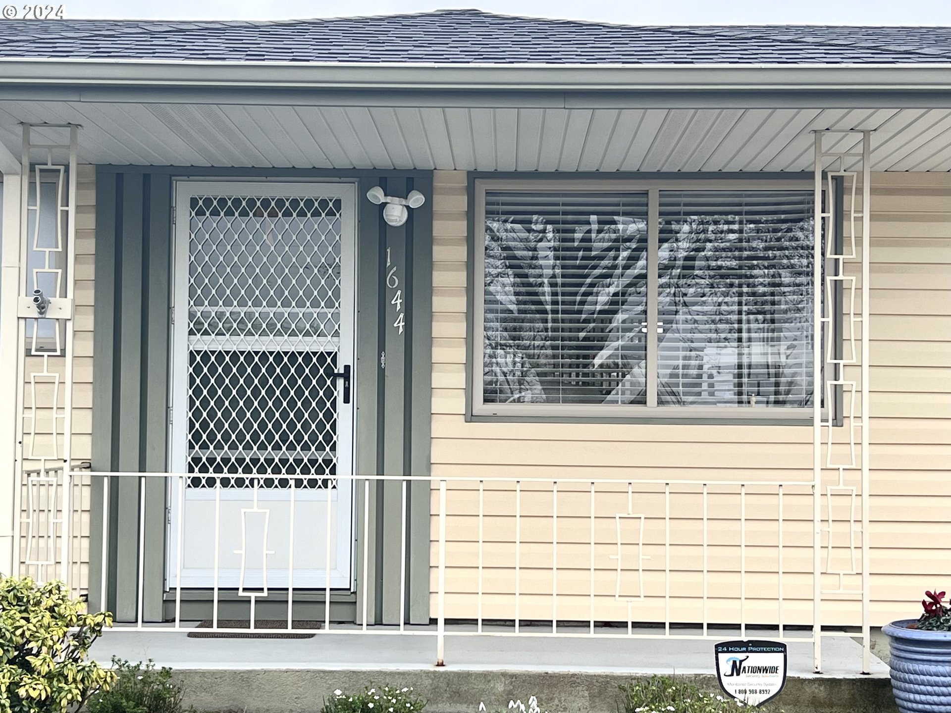 1644 Astor Way Woodburn, OR 97071 - Photo 2 of 28 a view of a door of a house