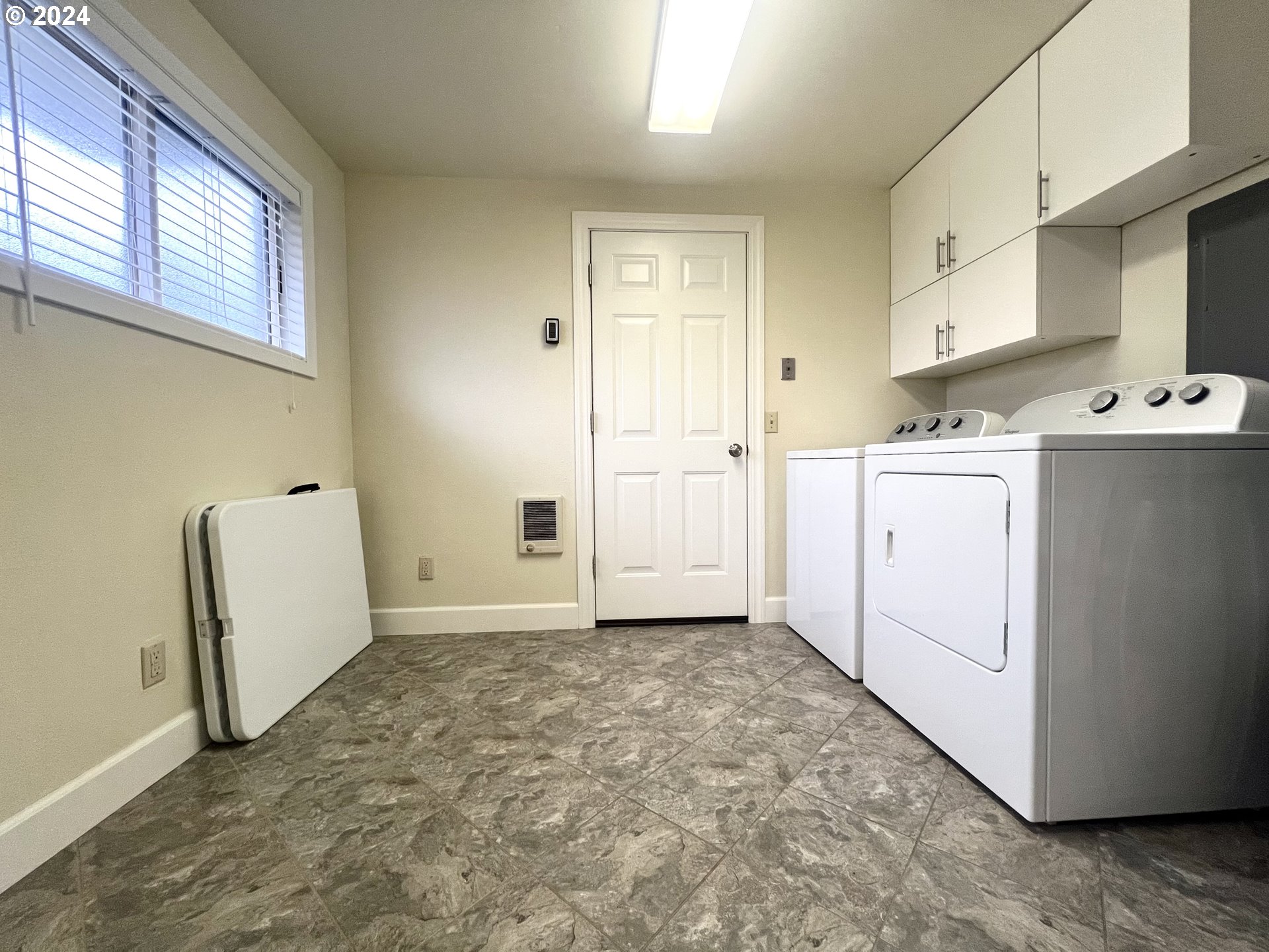 1644 Astor Way Woodburn, OR 97071 - Photo 21 of 28 a view of a storage & utility room with washer and dryer