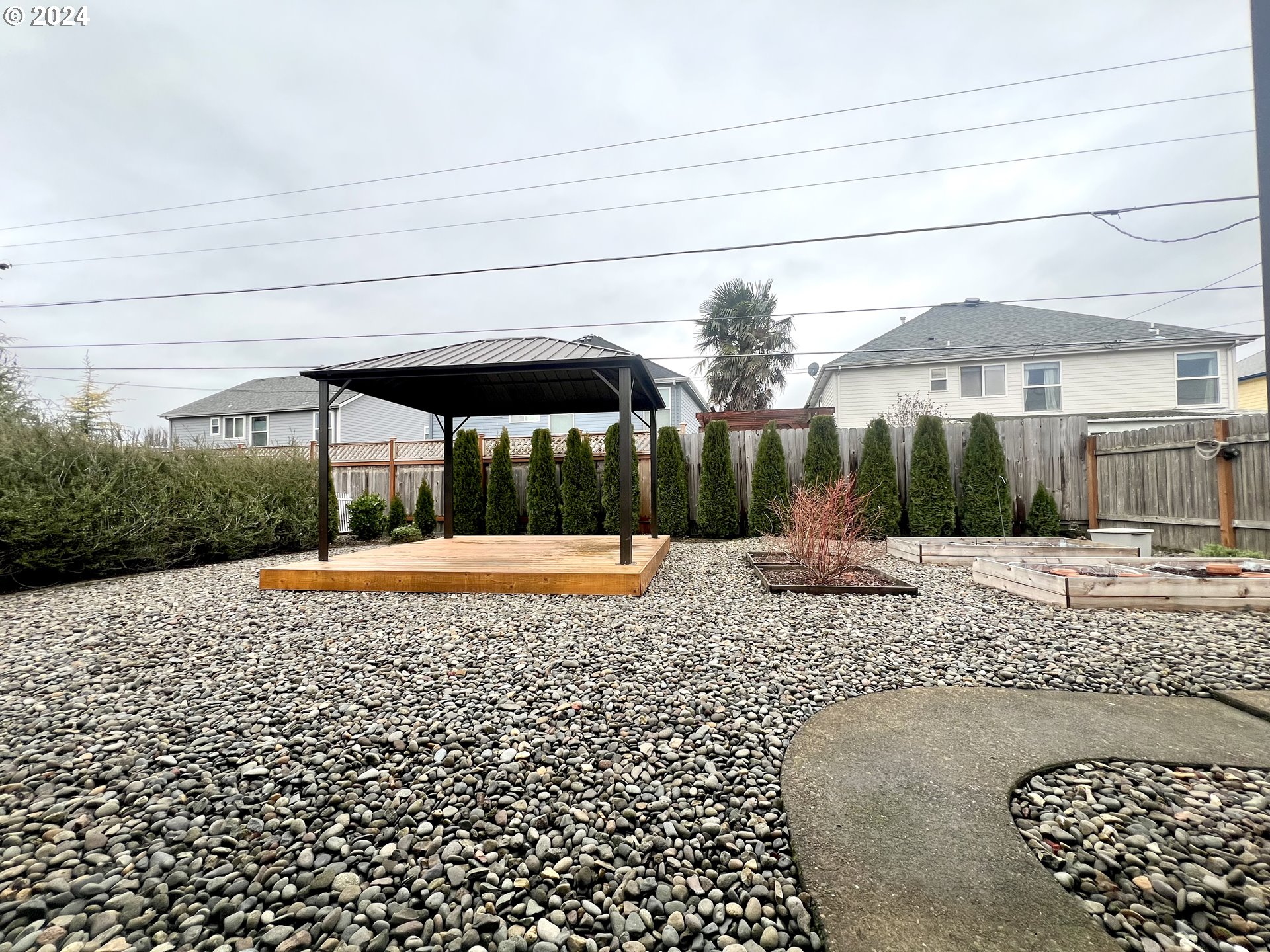 1644 Astor Way Woodburn, OR 97071 - Photo 25 of 28 a view of a backyard