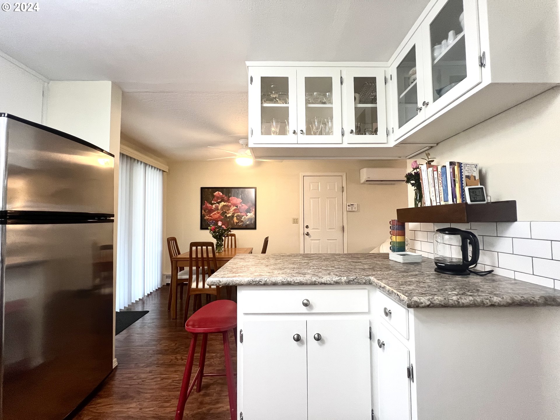 1644 Astor Way Woodburn, OR 97071 - Photo 10 of 28 a kitchen with a refrigerator and countertop