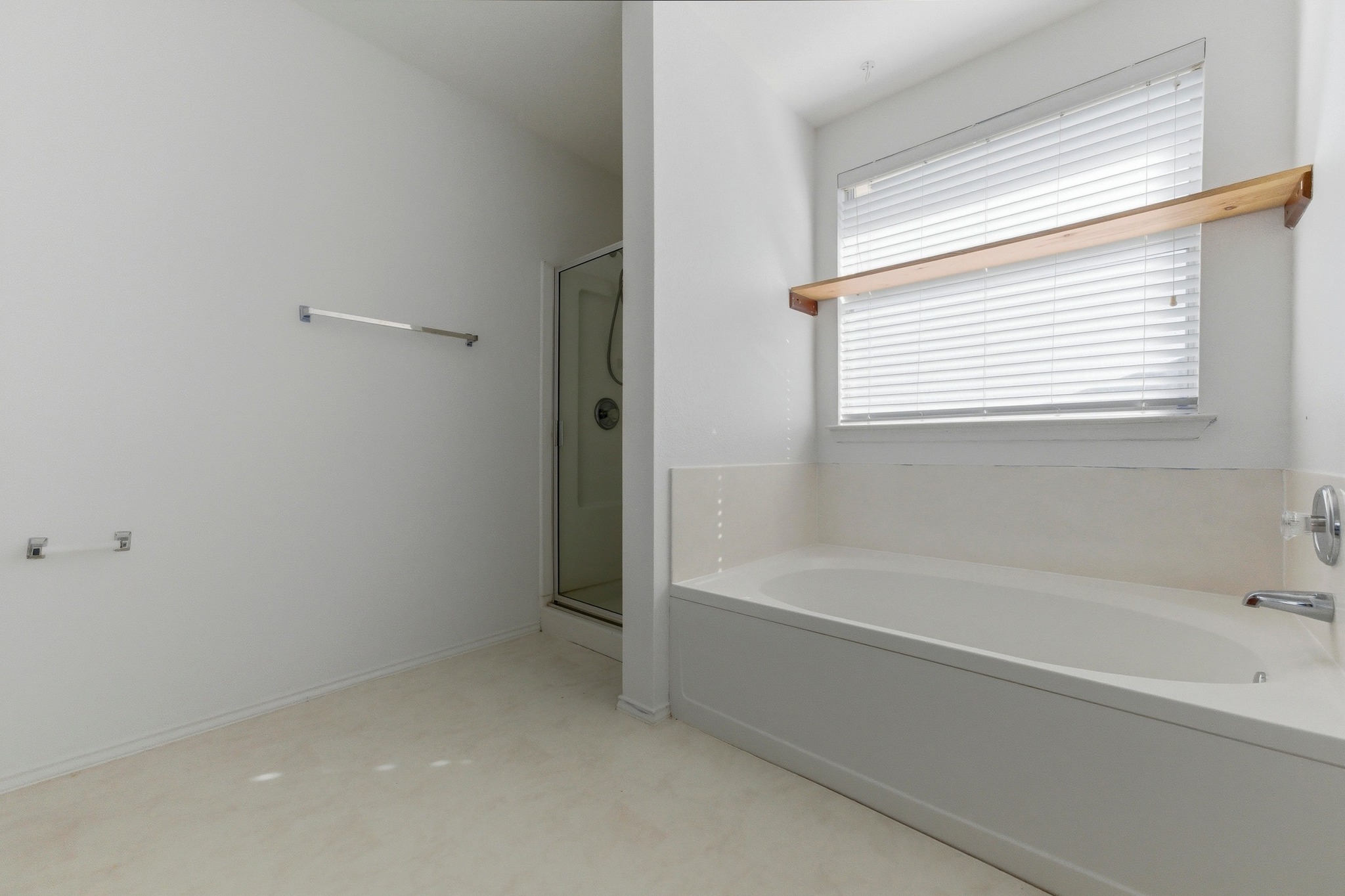 113 Spring Branch Cove Kyle, TX 78640 - Photo 16 of 33 Bathroom with a shower stall and a bath
