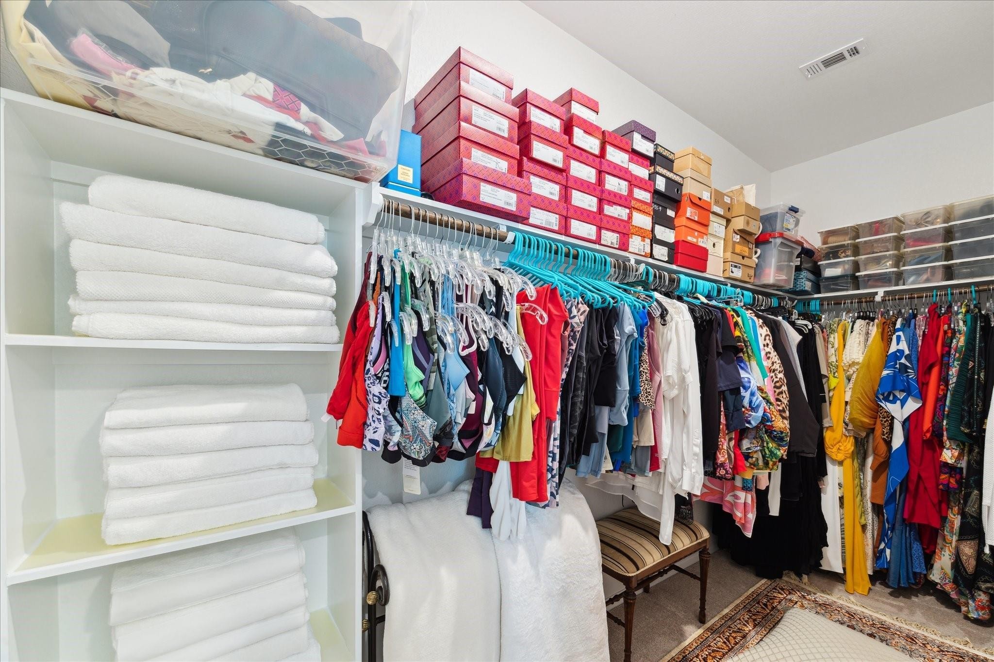 23502 Glenbuck St Spring Spring, TX 77373 - Photo 11 of 21 a view of walk in closet with clothes