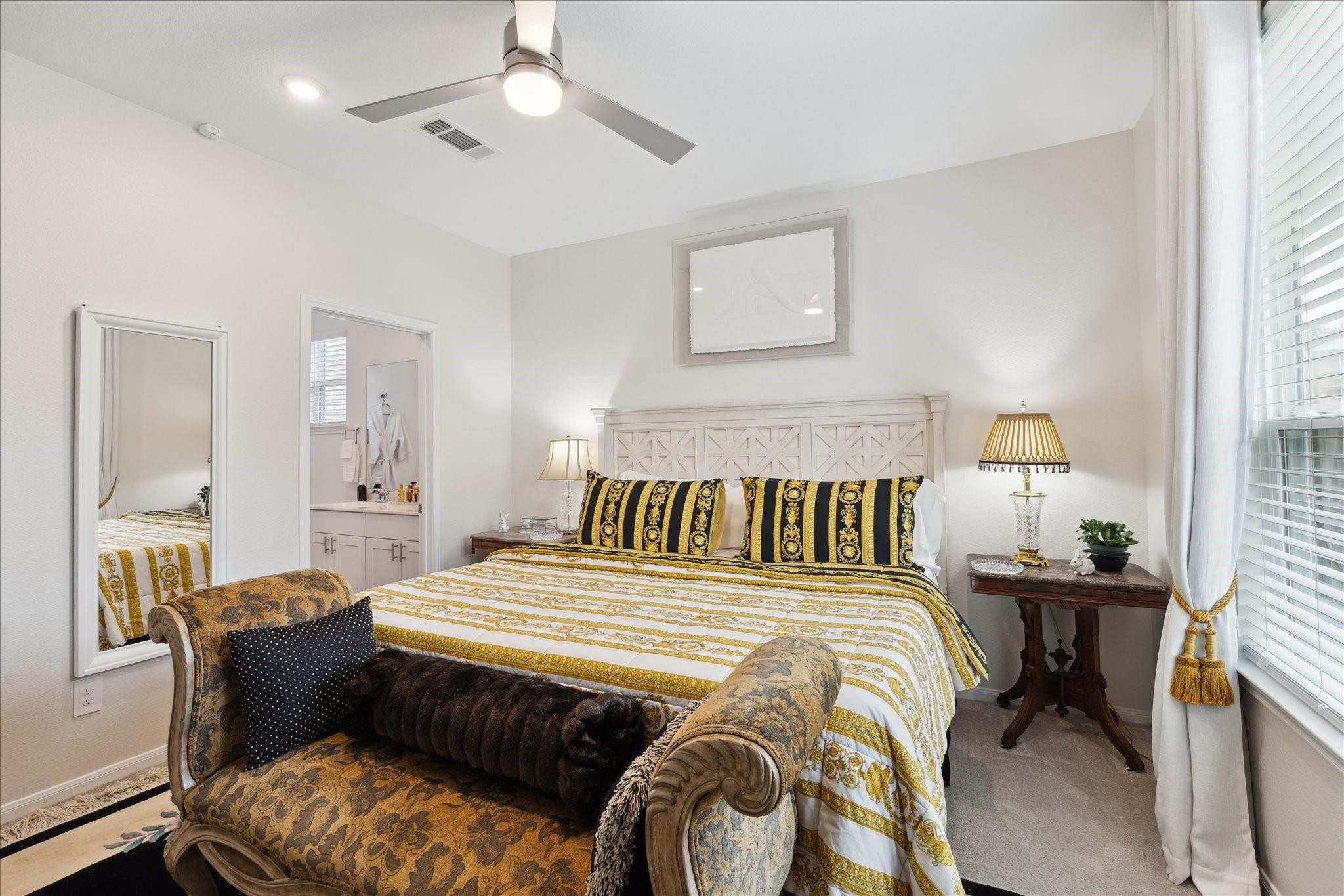 23502 Glenbuck St Spring Spring, TX 77373 - Photo 13 of 21 a bedroom with a bed and wooden floor