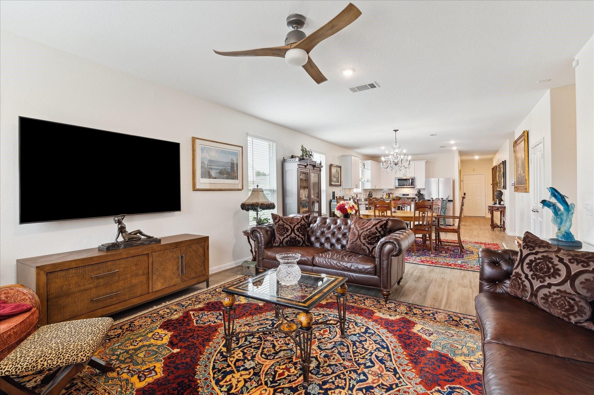23502 Glenbuck St Spring Spring, TX 77373 - Photo 15 of 21 a living room with furniture and a flat screen tv