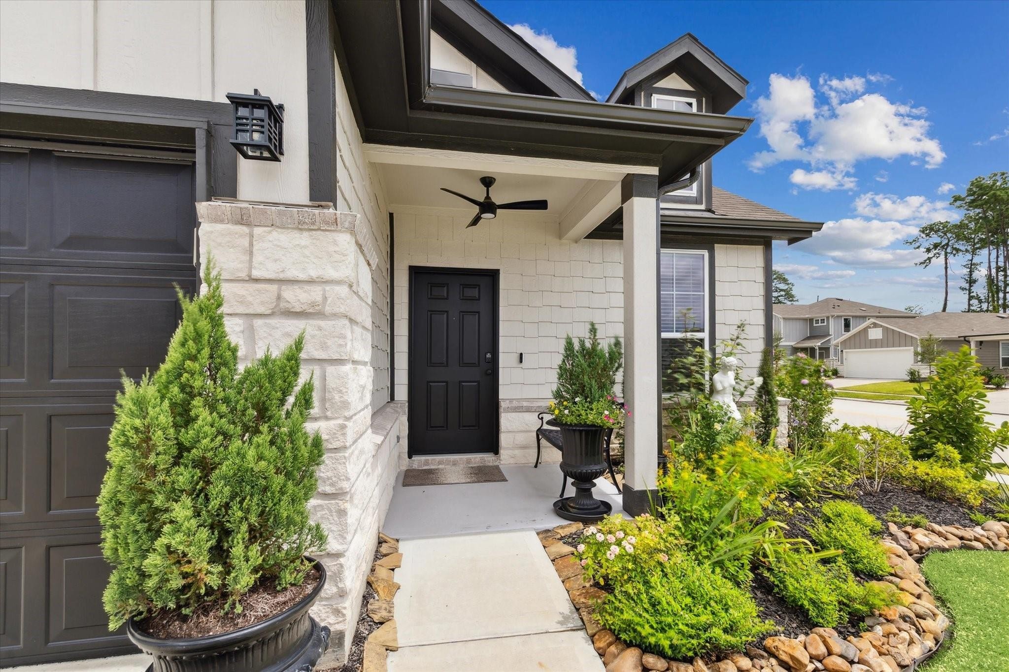 23502 Glenbuck St Spring Spring, TX 77373 - Photo 21 of 21 a front view of a house with garden