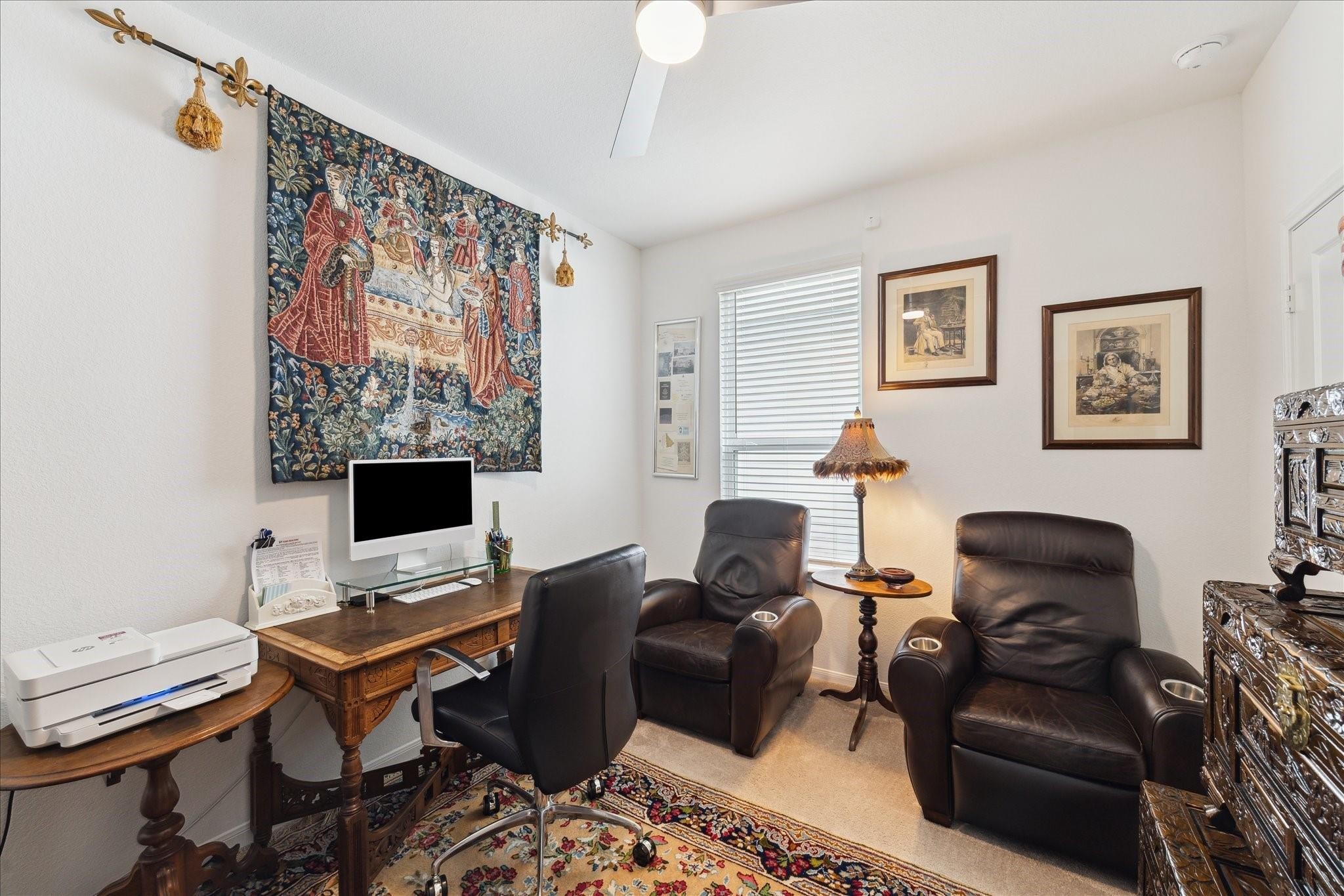 23502 Glenbuck St Spring Spring, TX 77373 - Photo 8 of 21 a livingroom with workspace and a couch