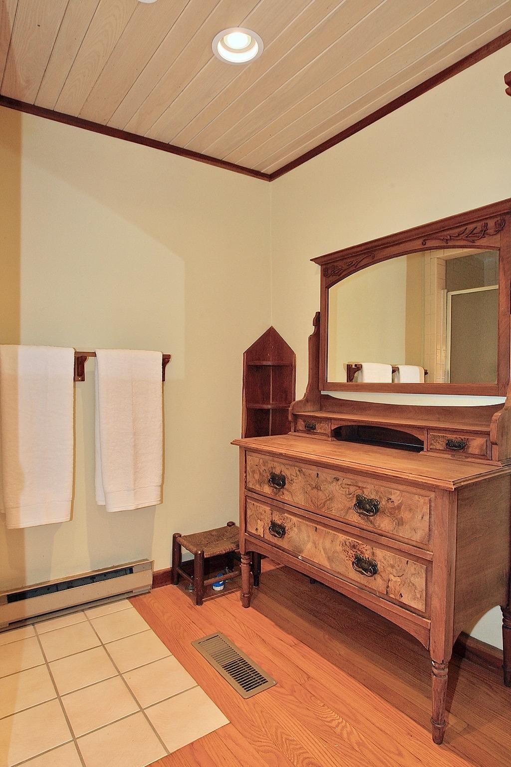398 George Reed Lane Northwest Floyd, VA 24091 - Photo 25 of 61 a room with a dresser and a mirror