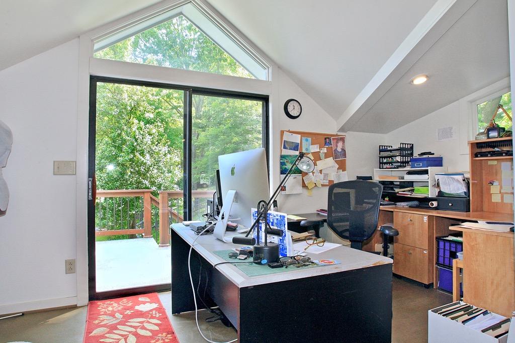 398 George Reed Lane Northwest Floyd, VA 24091 - Photo 33 of 61 a view of a workspace with furniture and a window