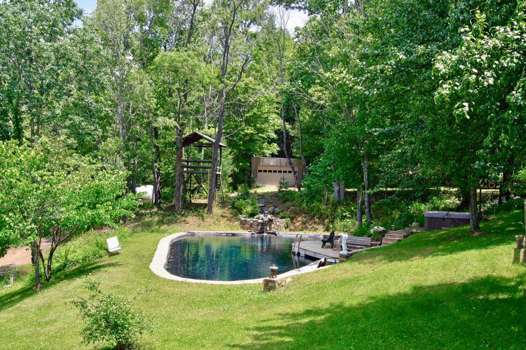 398 George Reed Lane Northwest Floyd, VA 24091 - Photo 60 of 61 a swimming pool with outdoor seating and yard