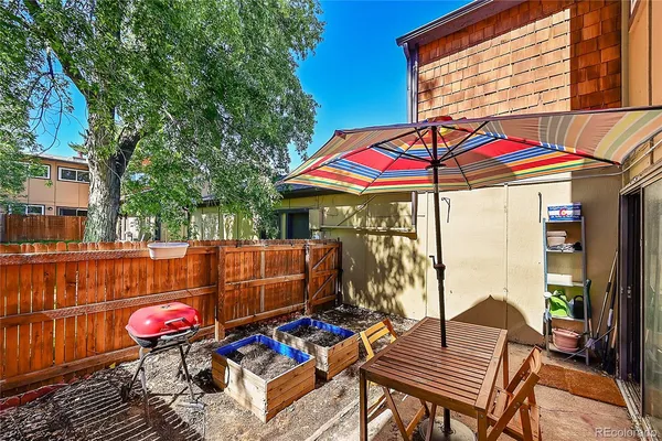 an outdoor space with patio lots of furniture