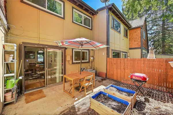 a backyard of a house with seating space