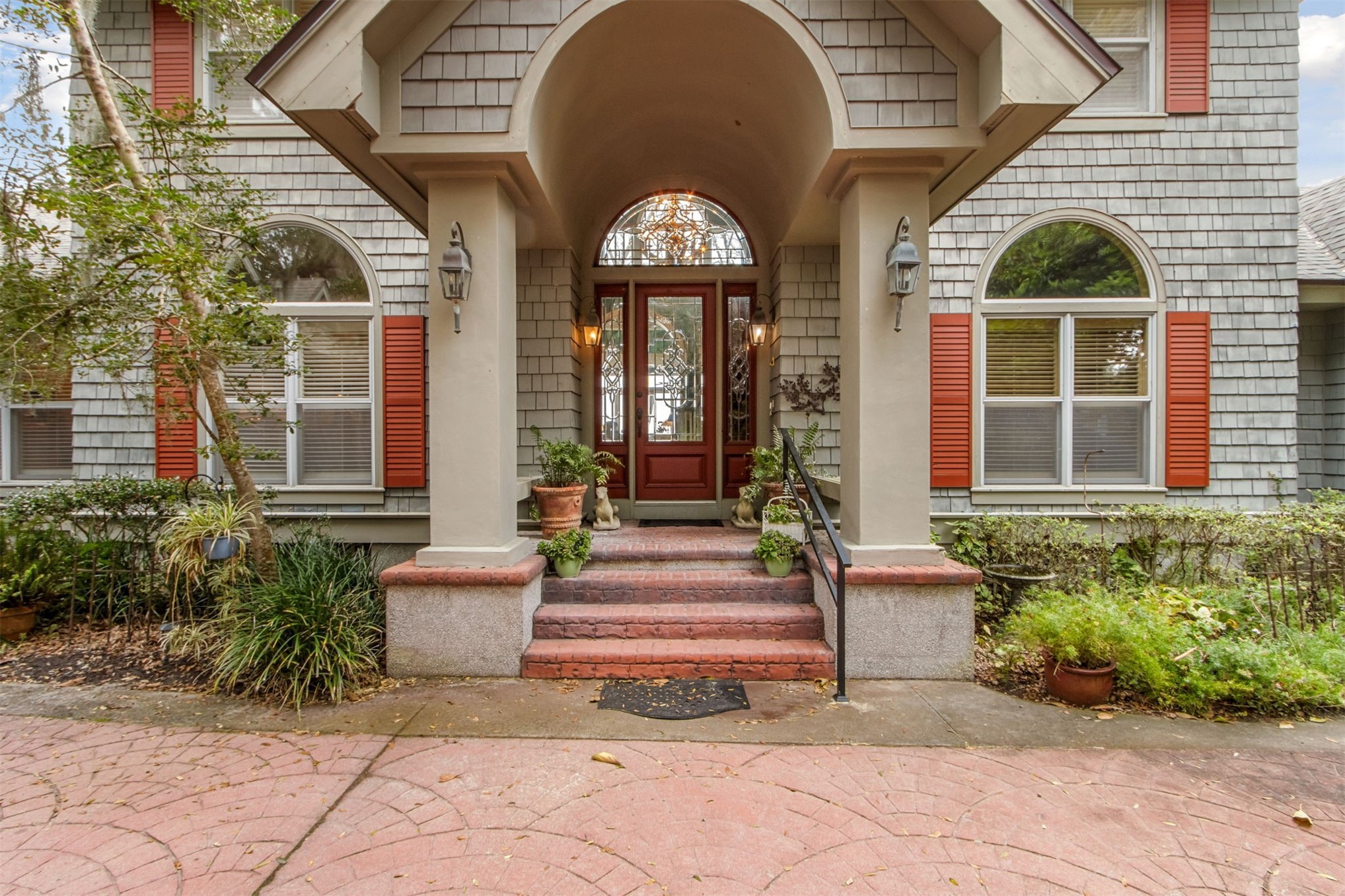 76 Marsh Creek Road Amelia Island, FL 32034 - Photo 2 of 100 a front view of a house with a porch
