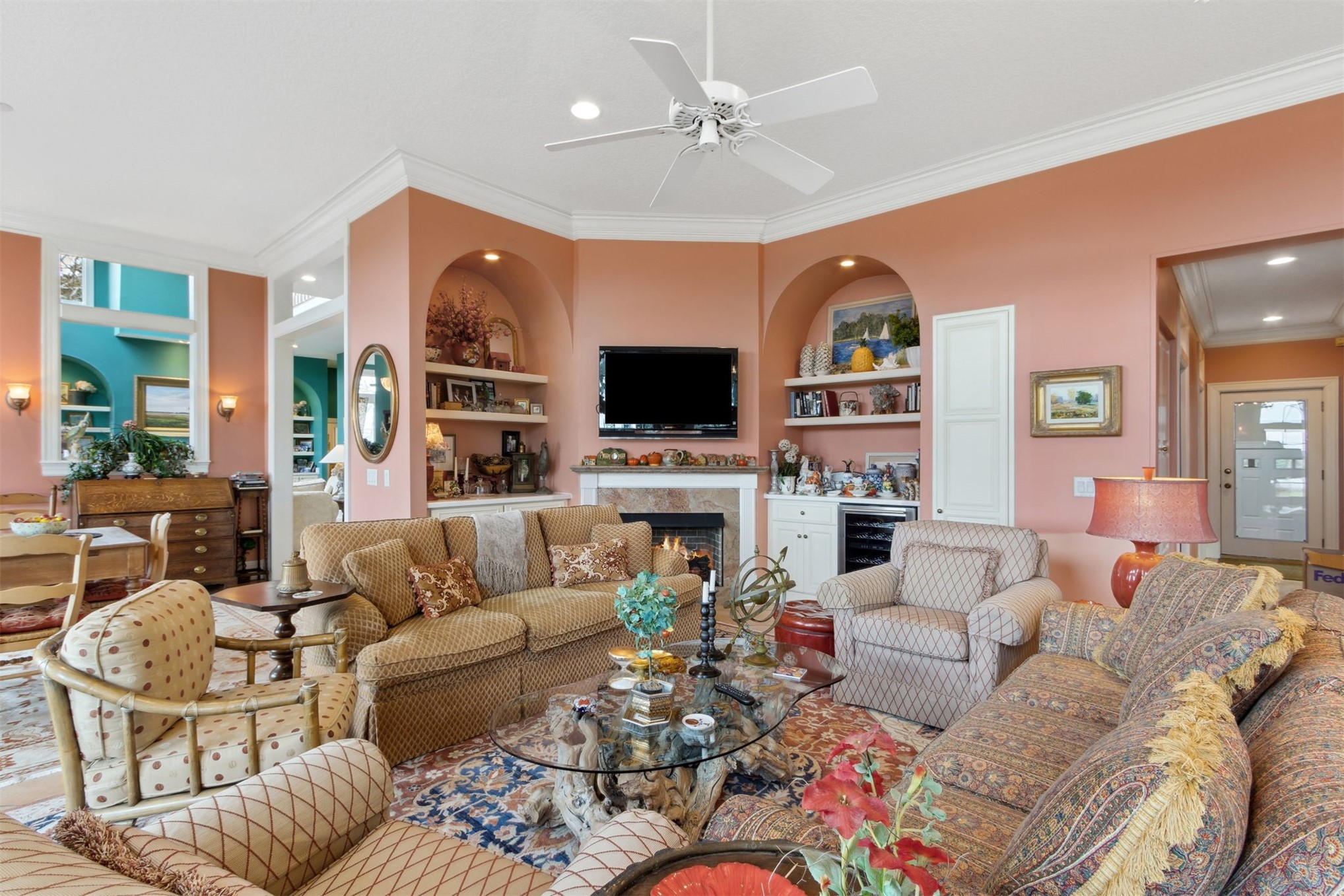 76 Marsh Creek Road Amelia Island, FL 32034 - Photo 29 of 100 a living room with furniture a flat screen tv and a fireplace