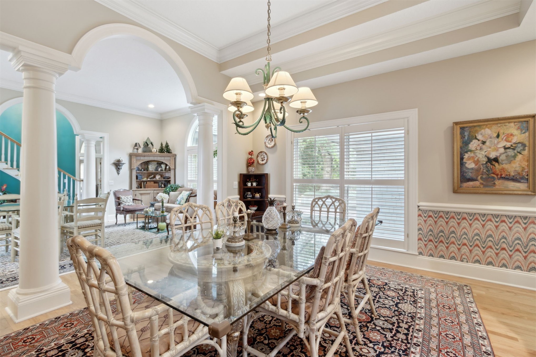 76 Marsh Creek Road Amelia Island, FL 32034 - Photo 33 of 100 a view of a dining room with furniture a chandelier and wooden floor