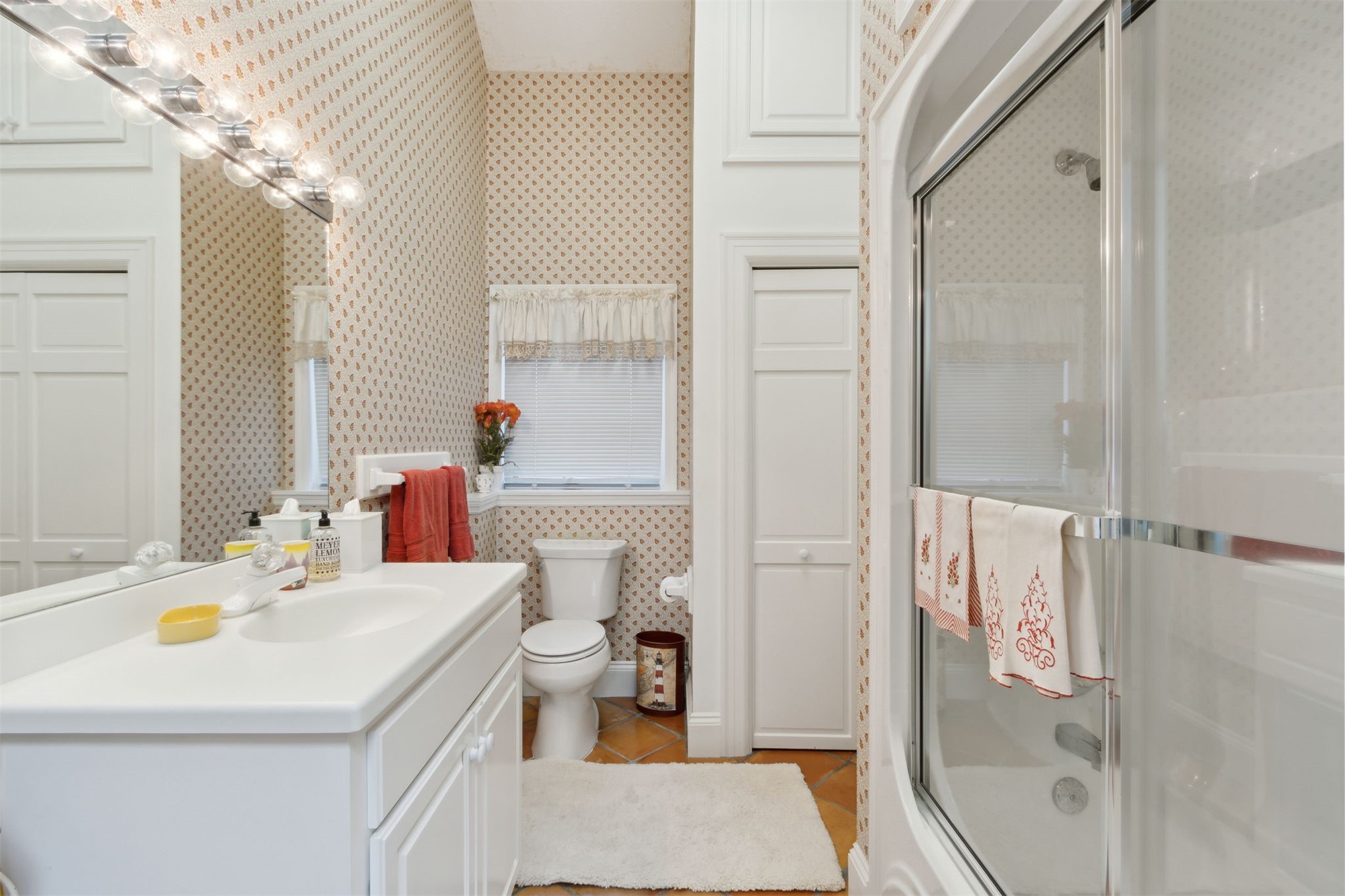 76 Marsh Creek Road Amelia Island, FL 32034 - Photo 54 of 100 a bathroom with a sink a toilet and shower