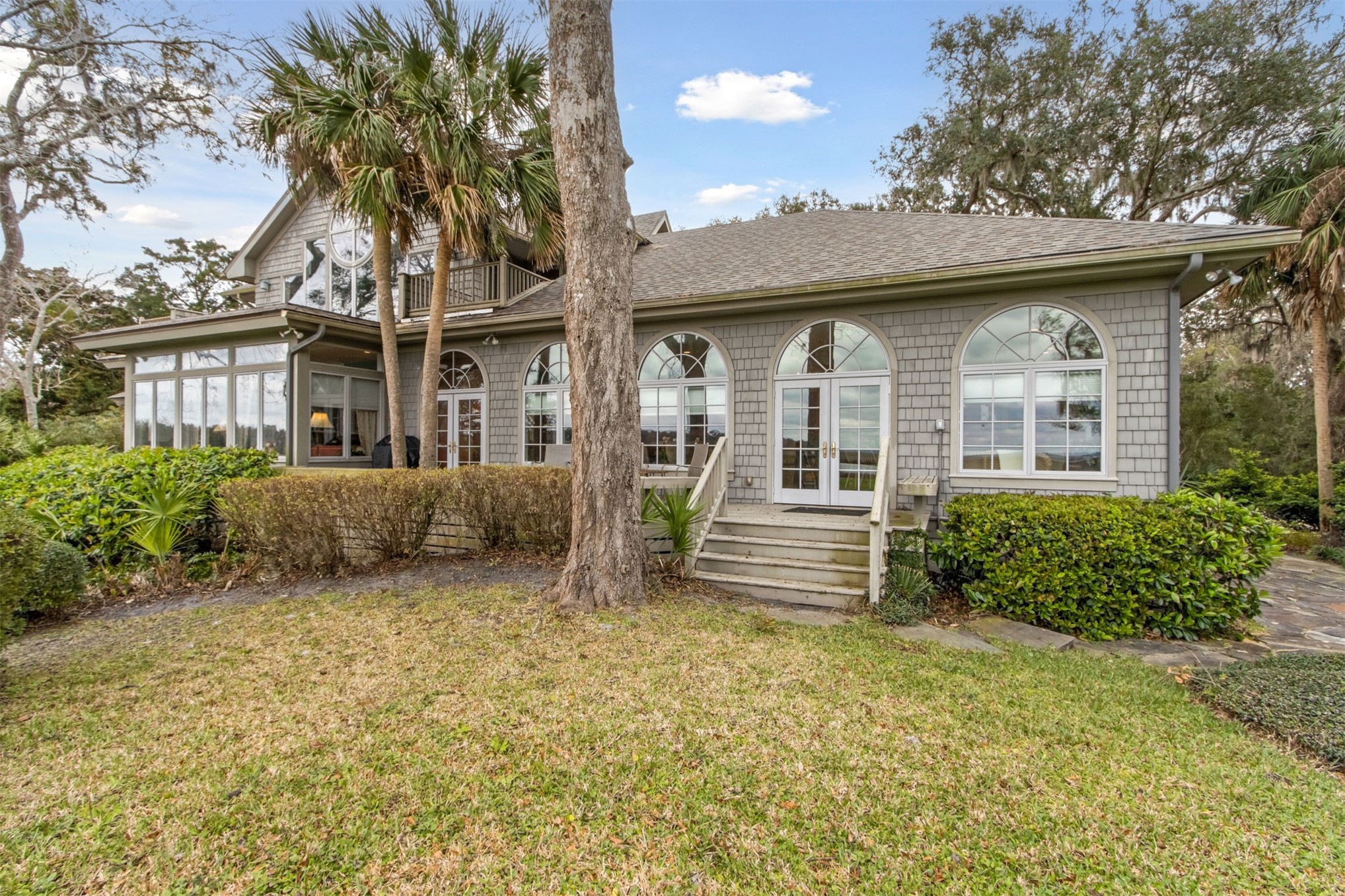 76 Marsh Creek Road Amelia Island, FL 32034 - Photo 75 of 100 front view of a house with a yard