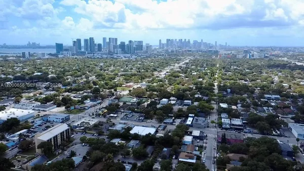 an aerial view of a city with lots of residential buildings