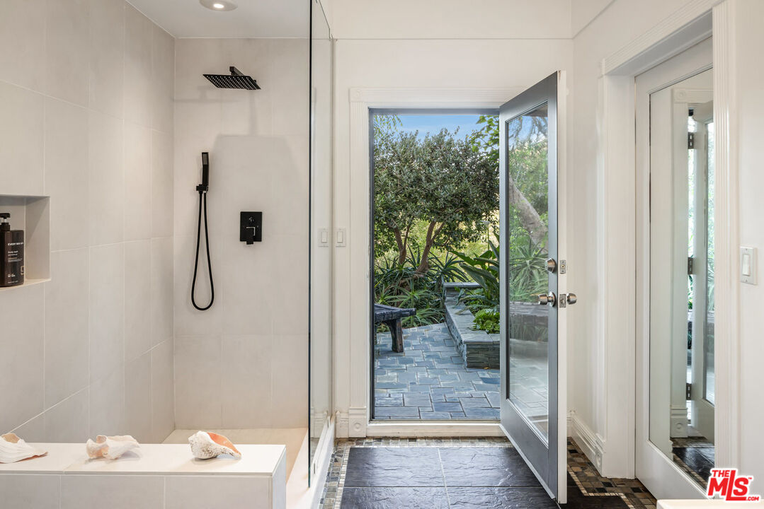 7770 Firenze Avenue Los Angeles, CA 90046 - Photo 20 of 32 a bathroom with a shower
