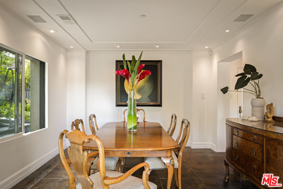 7770 Firenze Avenue Los Angeles, CA 90046 - Photo 8 of 32 a view of a dining room with furniture window and outside view