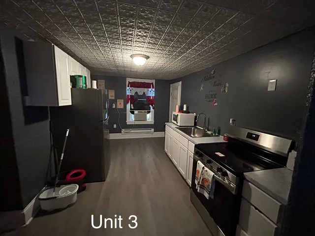 a kitchen with granite countertop lots of counter top space