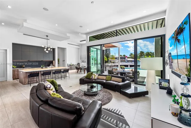 a kitchen with refrigerator and cabinets