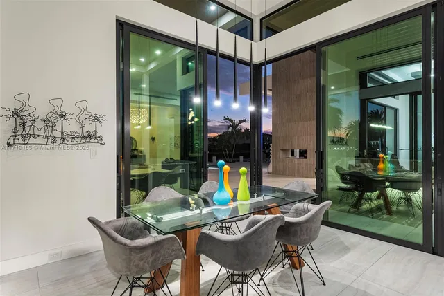 a view of swimming pool with seating area