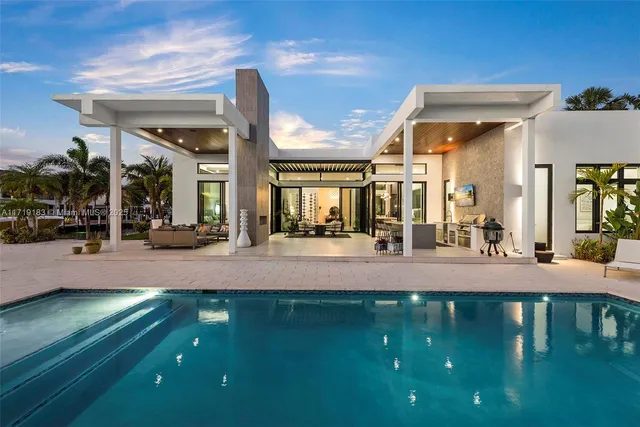 a outdoor living space with furniture and a fireplace