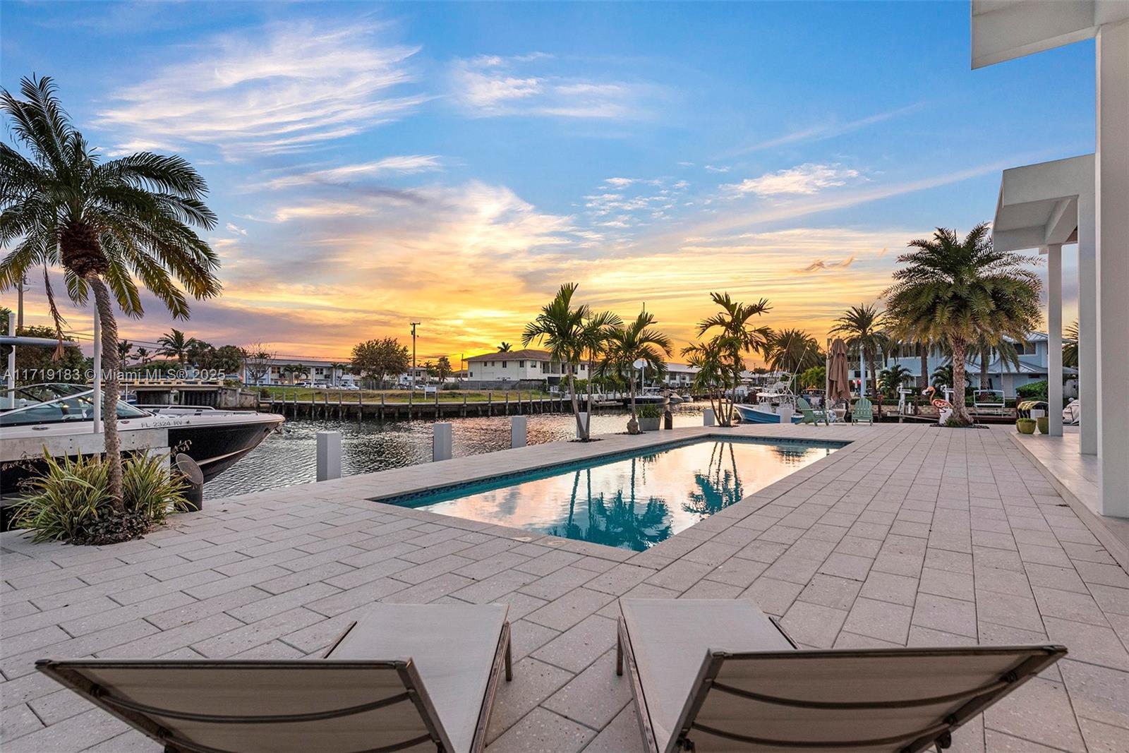 3701 Northeast 26th Avenue Lighthouse Point, FL 33064 - Photo 22 of 65 a view of swimming pool with seating area