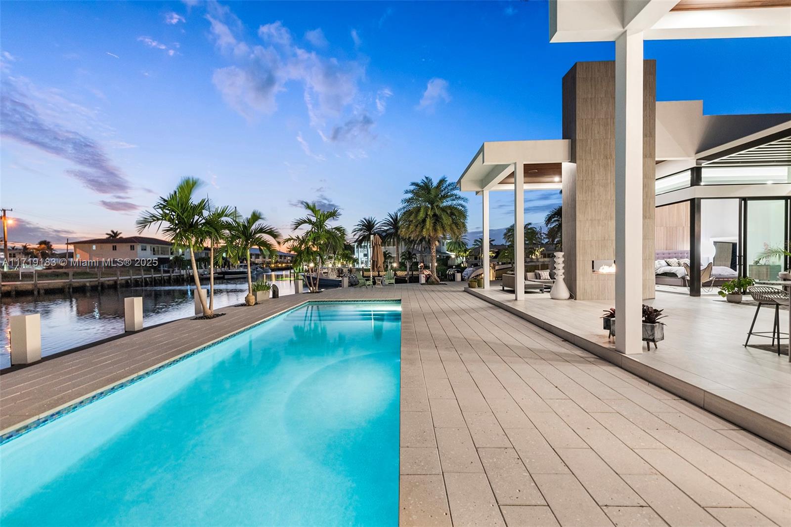 3701 Northeast 26th Avenue Lighthouse Point, FL 33064 - Photo 57 of 65 a view of a swimming pool with sitting area