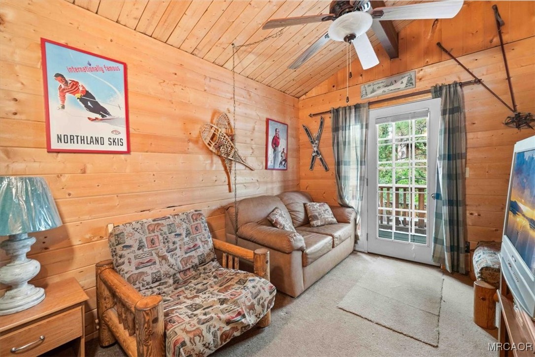 817 Maple Lane Sugarloaf, CA 92386 - Photo 17 of 23 a living room with furniture and a flat screen tv