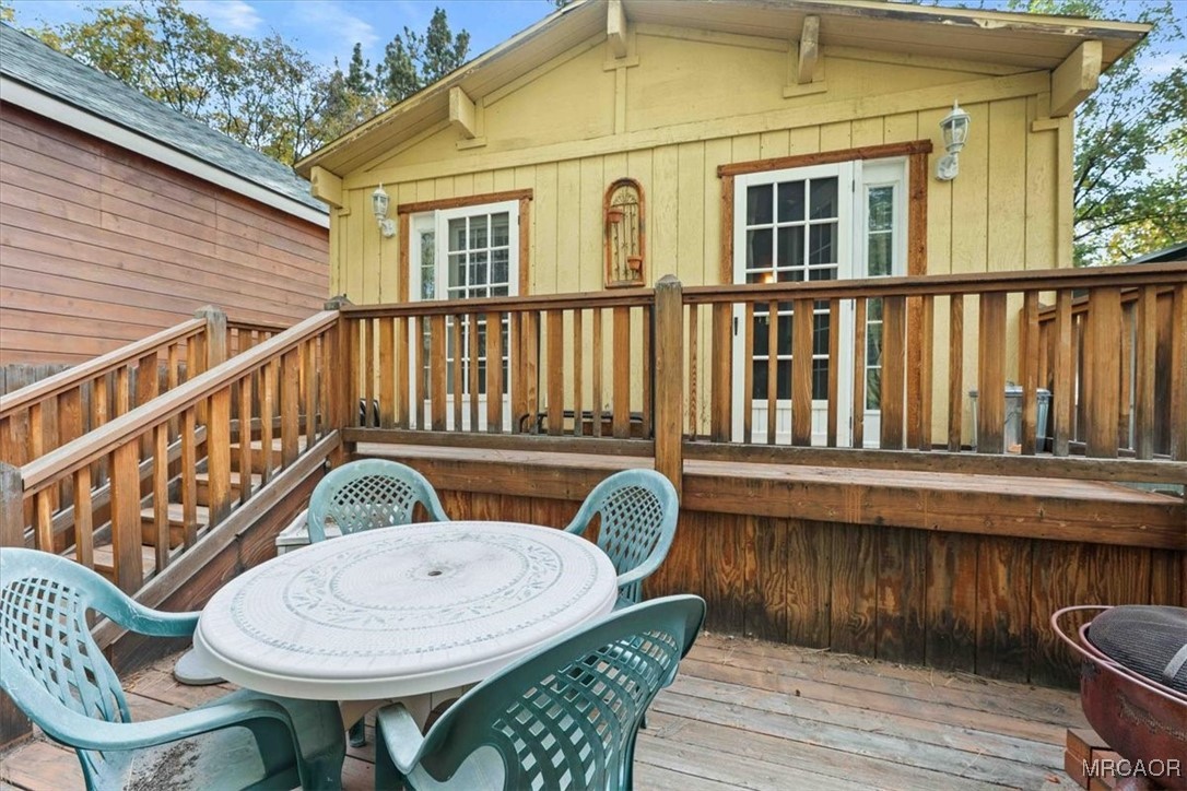 817 Maple Lane Sugarloaf, CA 92386 - Photo 23 of 23 a view of a chair and table in the balcony