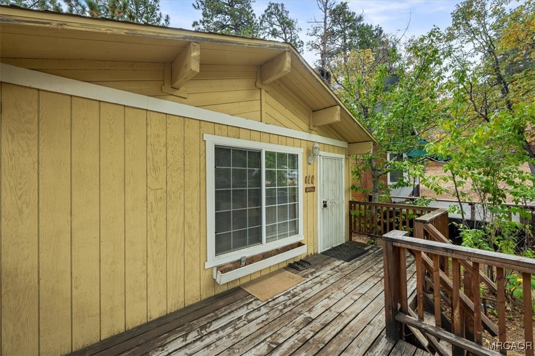 817 Maple Lane Sugarloaf, CA 92386 - Photo 5 of 23 a view of a house with a balcony