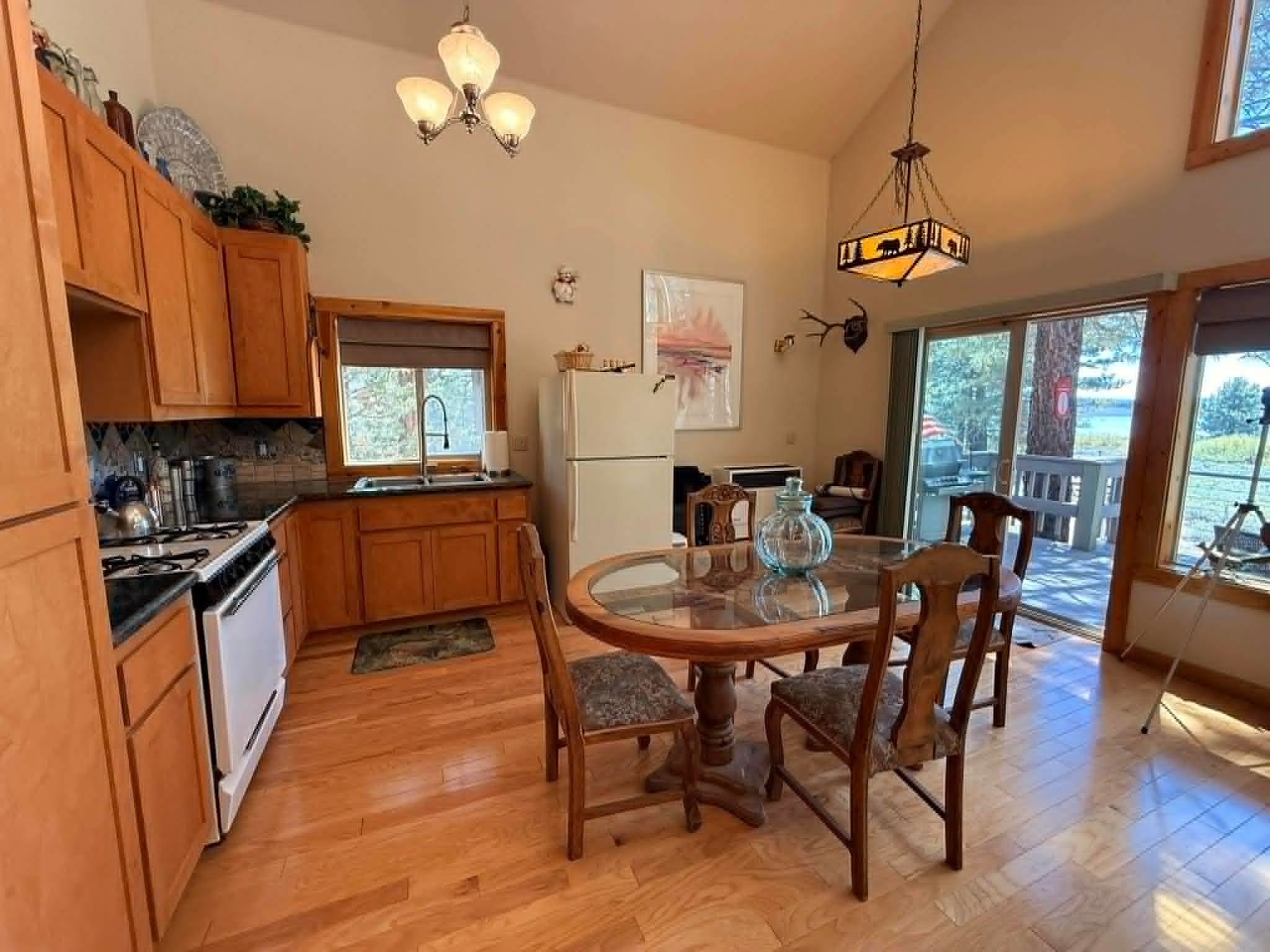 93 Juniper Road Beckwourth, CA 96129 - Photo 7 of 35 a view of a dining room with furniture window and wooden floor
