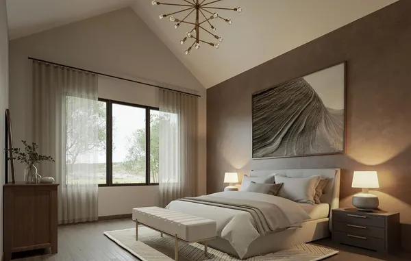 a bedroom with a bed and a painting on the wall