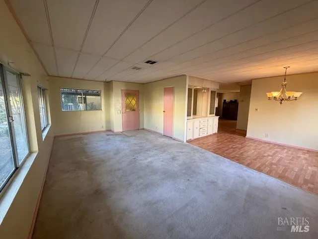 a view of a livingroom with a staircase