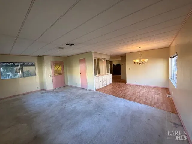 a view of livingroom with an empty space