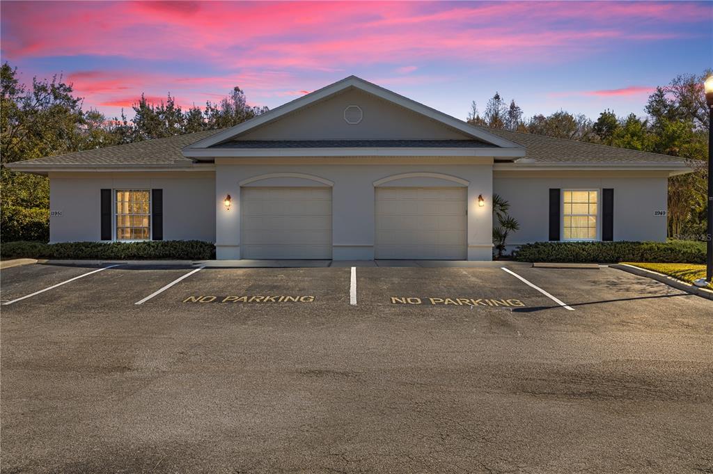 11951 Sheldon Road Tampa, FL 33626 - Photo 1 of 51 a view of a house with a yard